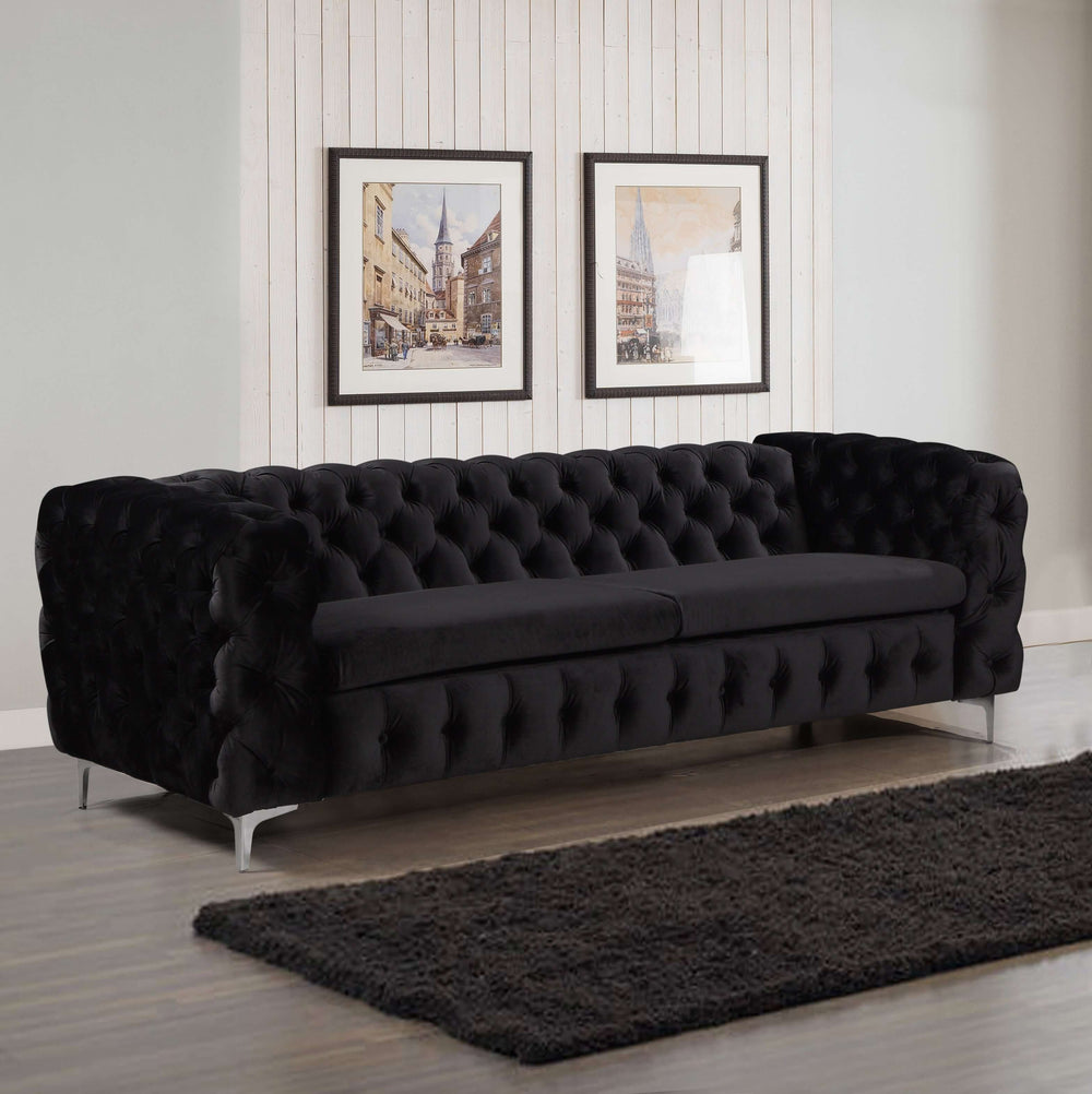 Black velvet 3 seater sofa with button tufting and metal legs, stylish addition for spacious living rooms.