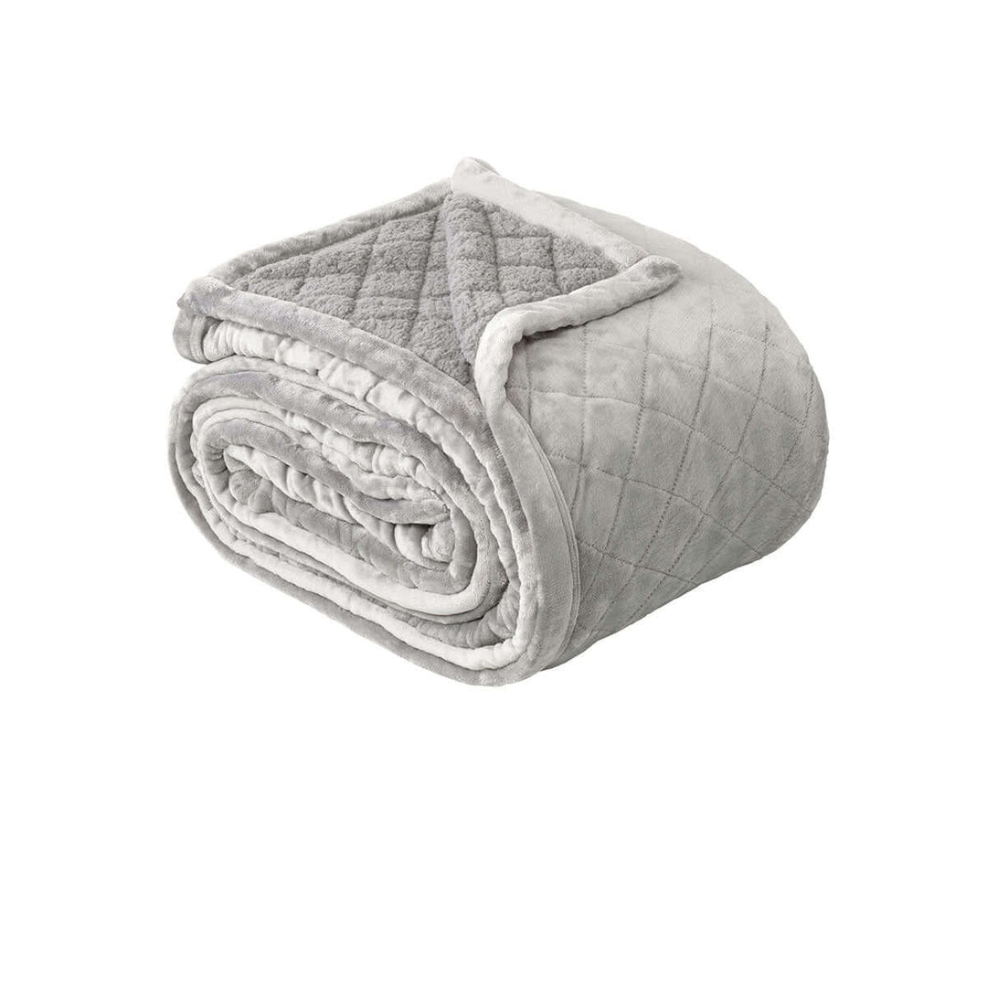 Affordable luxe Bianca Mansfield Aluminium Blanket with soft velvet and warm sherpa, ideal for DIY home comfort in winter.