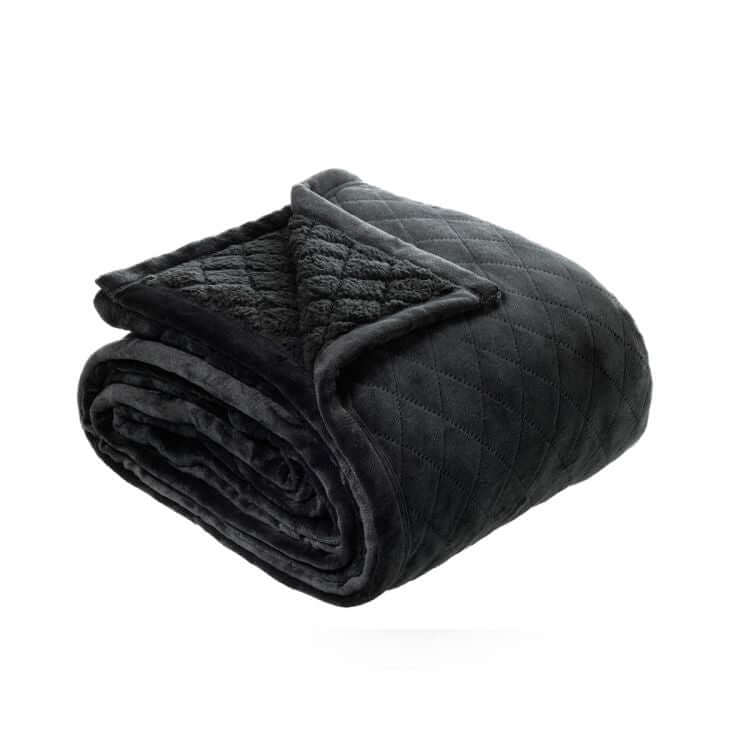 Affordable luxe Bianca Mansfield charcoal blanket, quality quilted velvet with lattice pattern, perfect for DIY winter warmth.