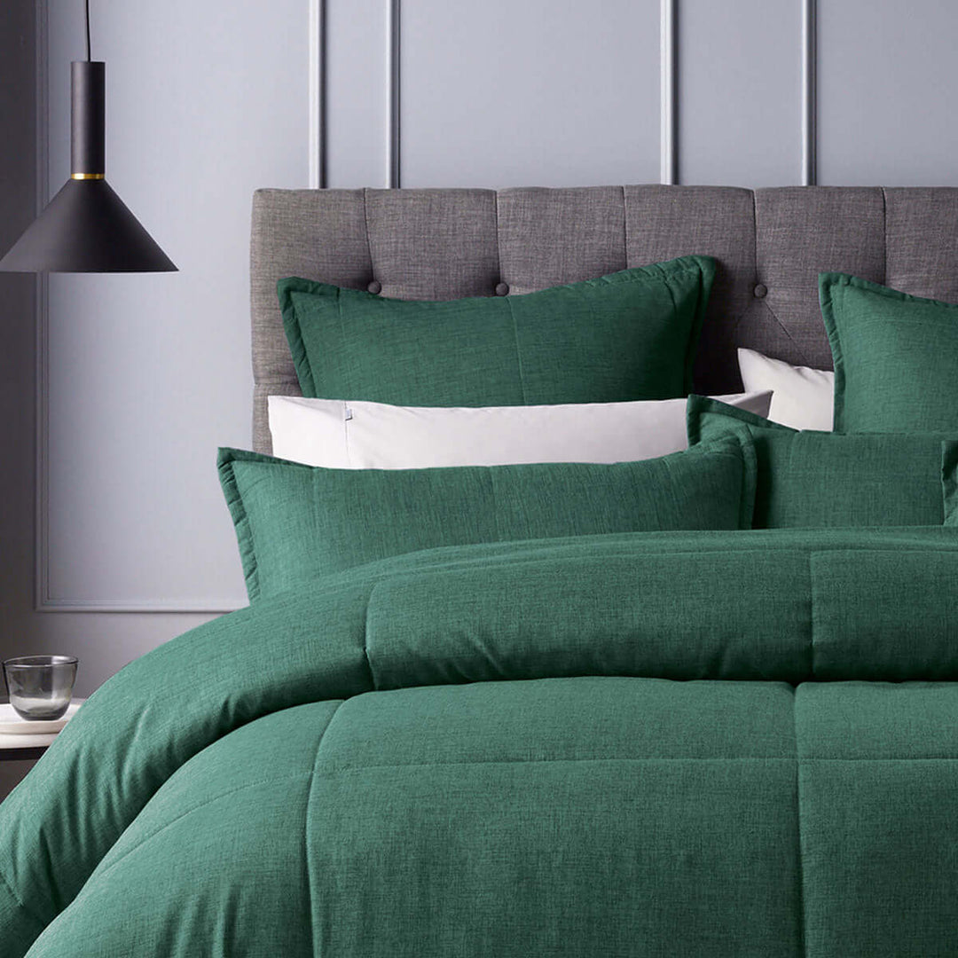 Bianca Maynard Green Comforter Set on stylish bed with quilted design, highlighting luxe, affordable, quality bedding for DIY decor.