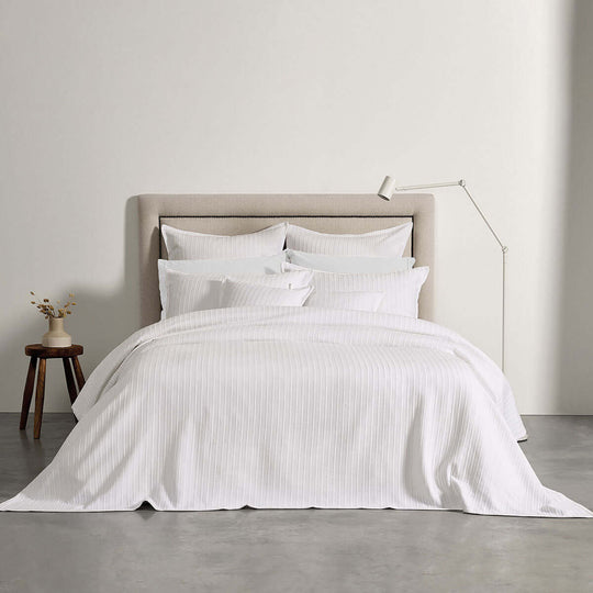 Affordable Bianca Evora White Cotton Jacquard Coverlet Set in a chic bedroom, showcasing luxe and quality design, easy care.