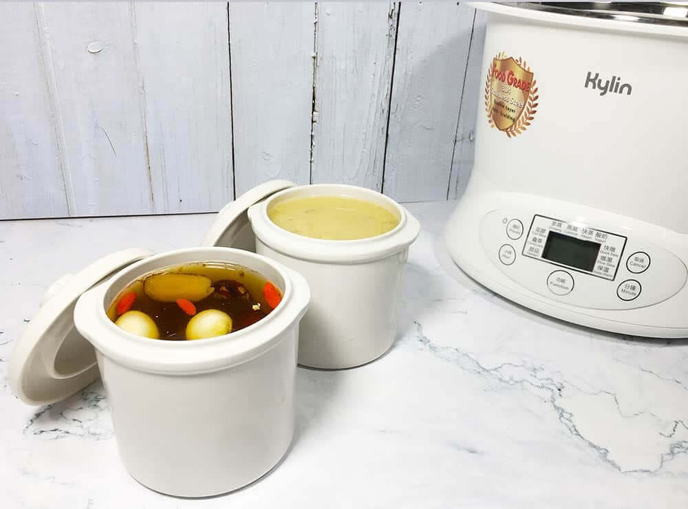 Kylin Electric Slow Cooker with white ceramic pots, showcasing affordable quality cooking and DIY meal prep options.