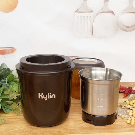 Kylin Electric Multi-Purpose Grinder, stainless steel bowl, compact design, affordable kitchen appliance for coffee, spices, and nuts.