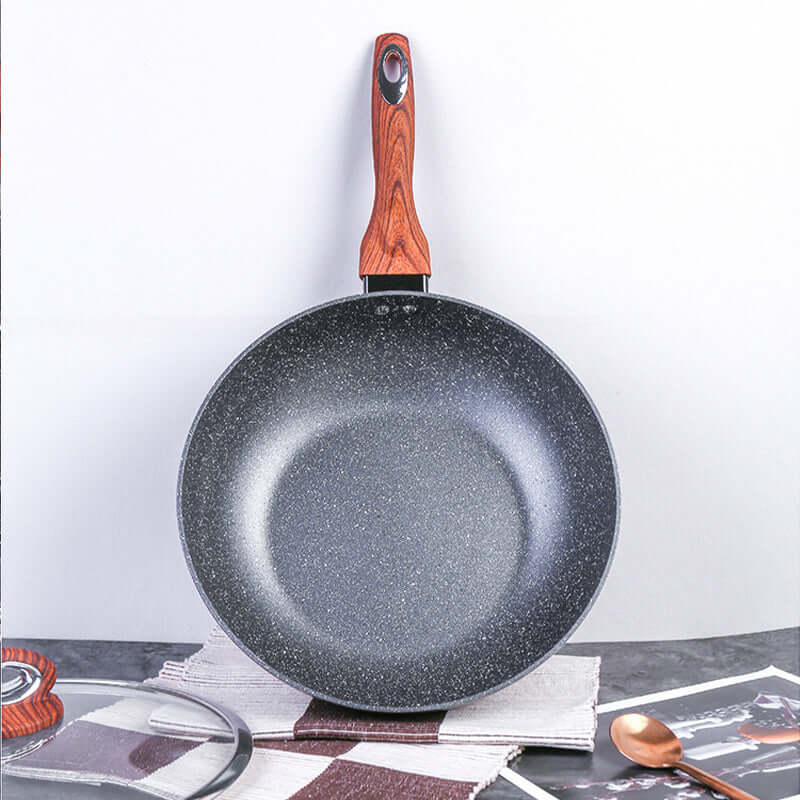 Justcook 30cm Marble Wok with wooden handle, perfect for healthy, non-stick cooking on various stovetops. Affordable quality cookware.