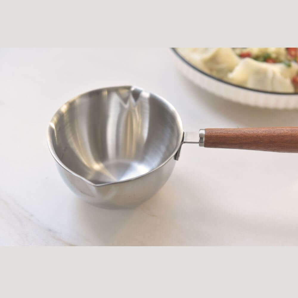 Kylin 304 stainless steel oil poured pot with wood handle, 200ml capacity, stylish and durable kitchen tool.