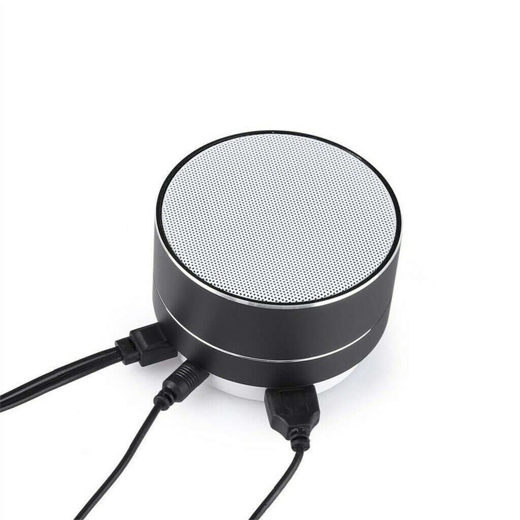 Portable wireless Bluetooth speaker in black with elegant design and connectivity options for great sound quality.