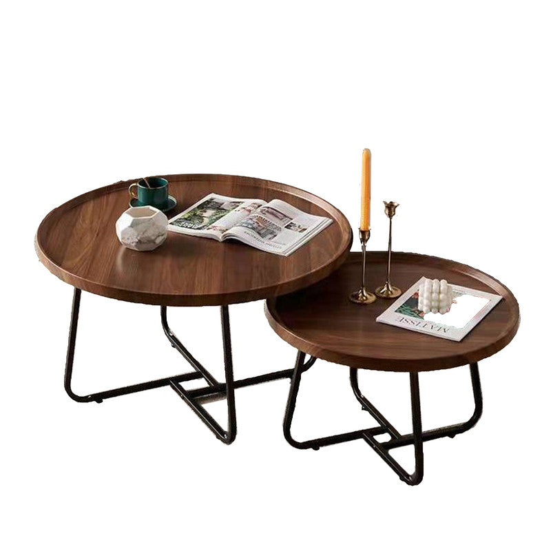 Set of 2 round walnut coffee tables with metal legs, featuring a nesting design for value and quality furniture in an affordable, stylish setup