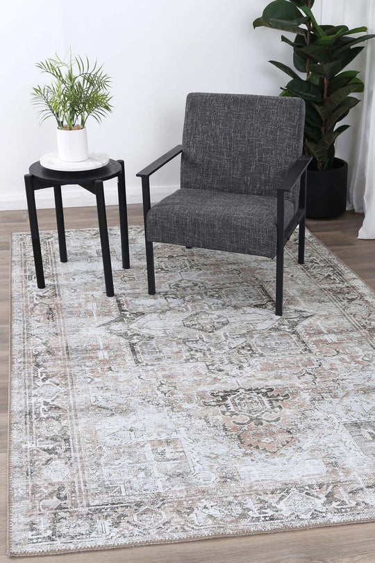 Transitional Babylon VTL119-3 rug in a modern living space with a chair and table, showcasing affordable luxury.