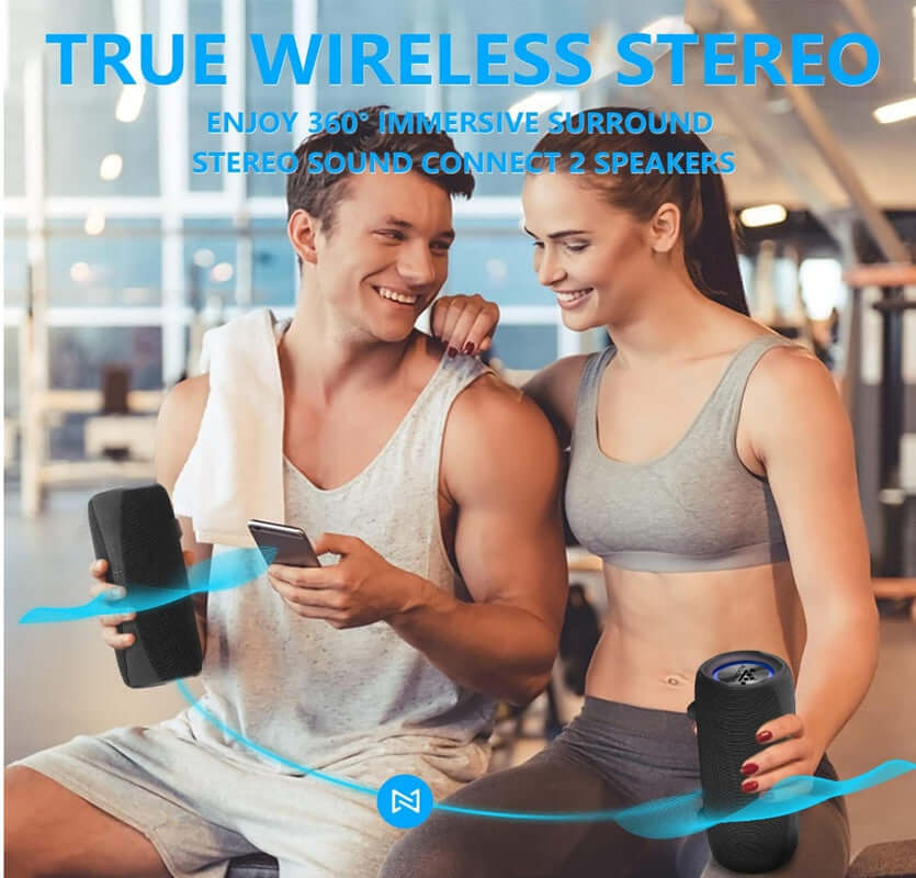 Two people enjoying true wireless stereo sound with portable Bluetooth speakers in a gym setting.