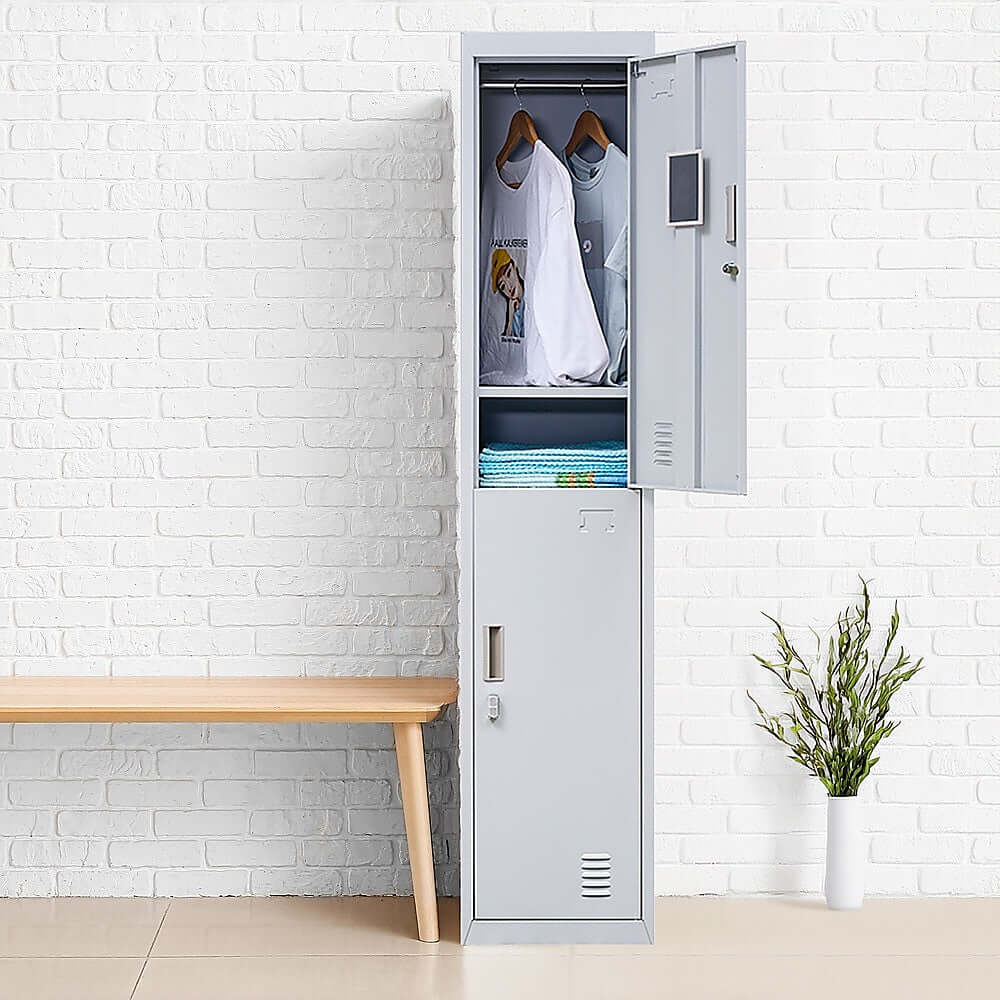 Affordable 2-door vertical locker for secure storage in office, gym, or school with clothing and towels inside.