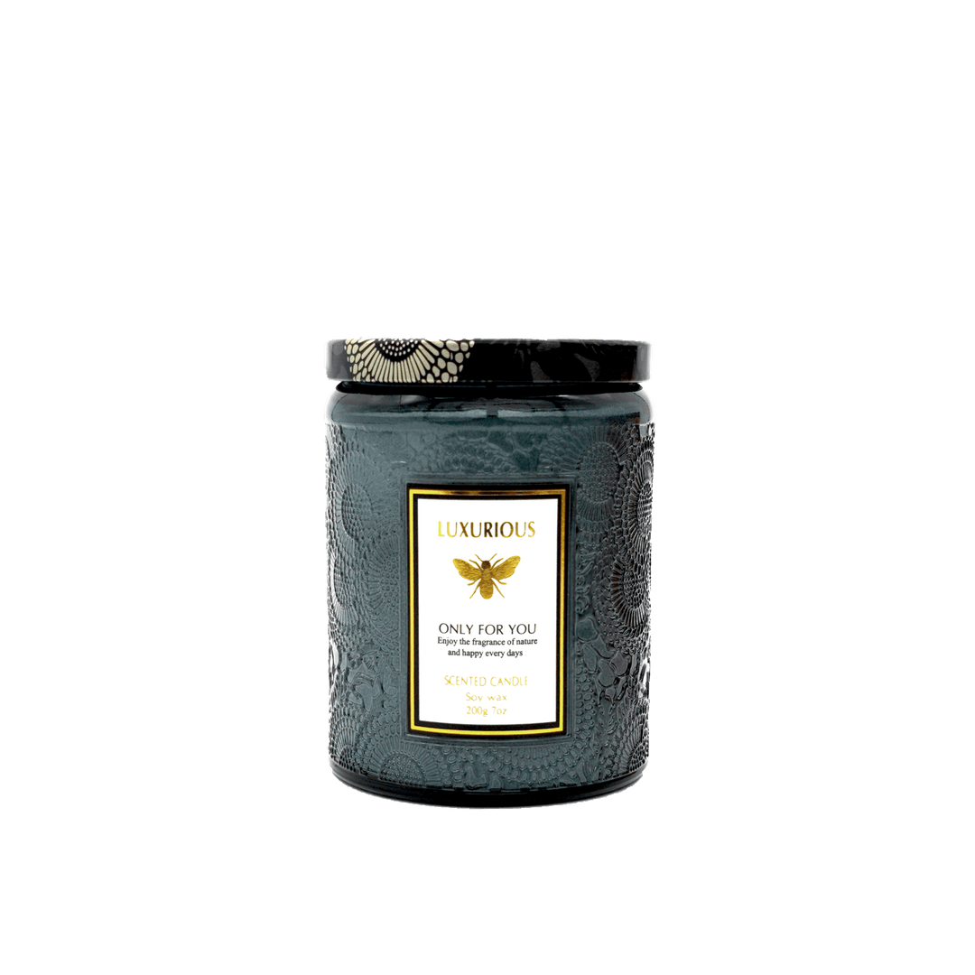 Faubourg Embossed Scented Candle in glass votive, elegant design for affordable luxury and home decor.