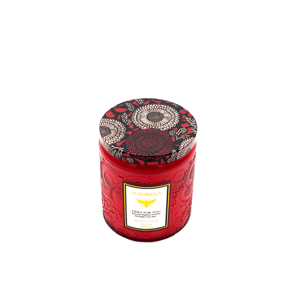 Luxurious red embossed scented candle with decorative lid, perfect for affordable and quality home decor.