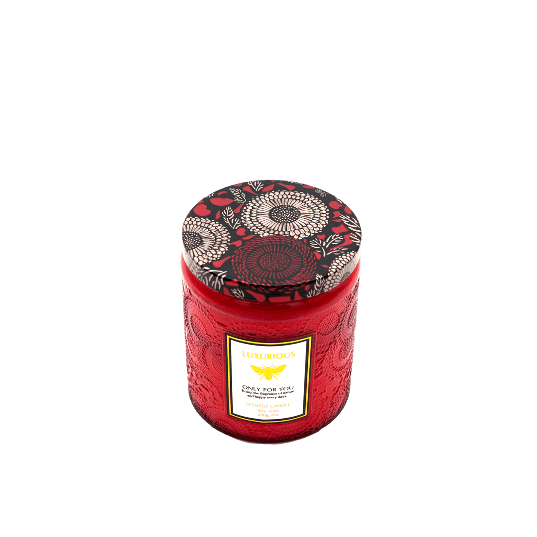 Luxurious red embossed scented candle with decorative lid, perfect for affordable and quality home decor.