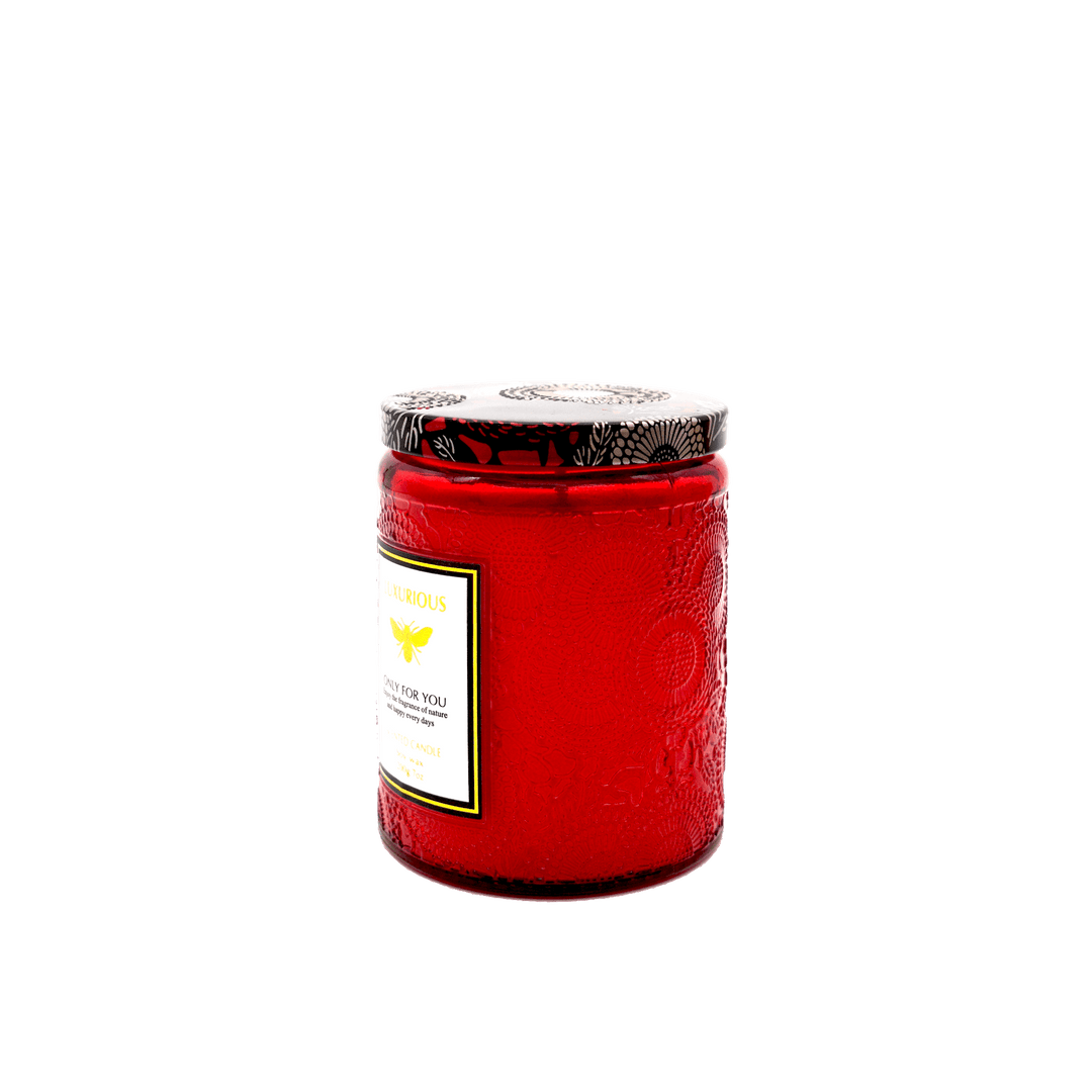 Faubourg Embossed Scented Candle in red glass votive, elegant design for luxurious decor, affordable quality home fragrance.