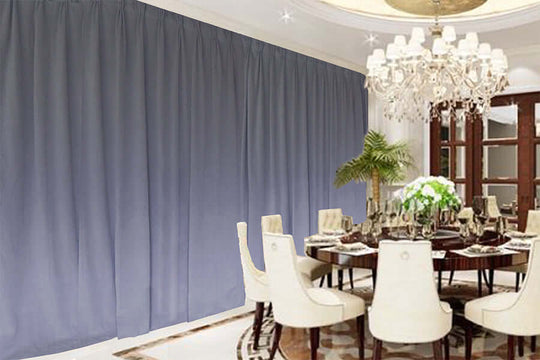 Elegant dining room featuring large purple grey velvet blockout curtains enhancing ambiance and style. Affordable luxury decor.