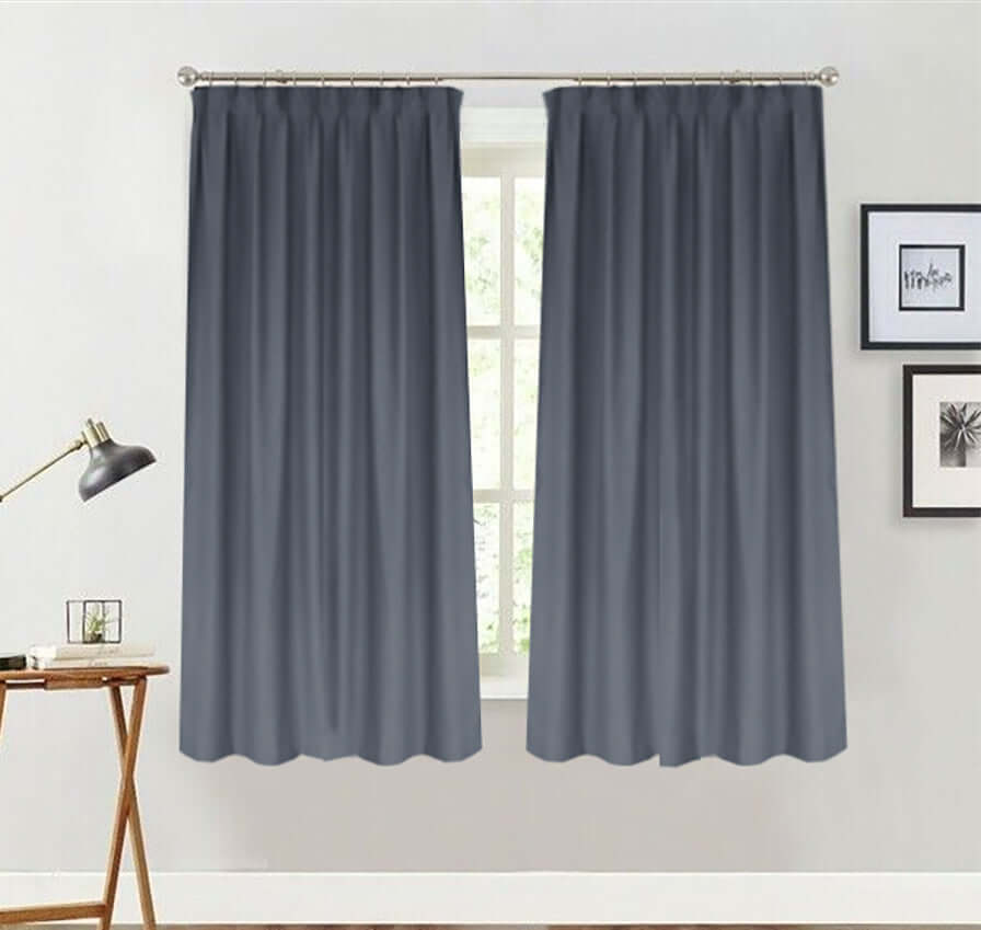 Affordable quality grey blue blockout curtains, two panels providing light control and elegance in any room.