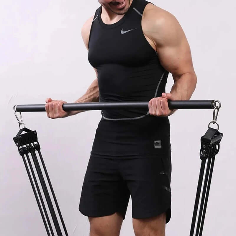 Man demonstrating NNEOBA Fitness Stick Pilates Bar for affordable strength training workouts.