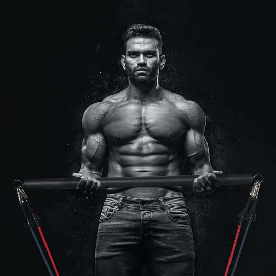 Muscular man demonstrating the NNEOBA Fitness Stick Pilates Bar for strength training in a stylish workout setting.