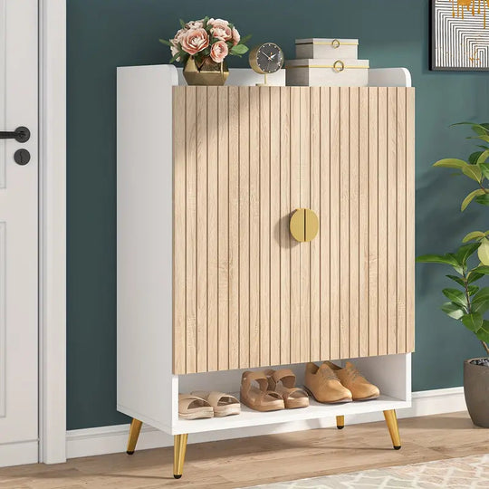 Contemporary 7-tier shoe storage cabinet in wood and gold with adjustable shelves, featuring decorative items on top and shoes stored below.