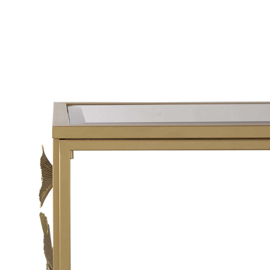 Floret mirrored console table with matte gold frame and mirrored top, featuring elegant 3D floral design accents. Affordable luxe decor.