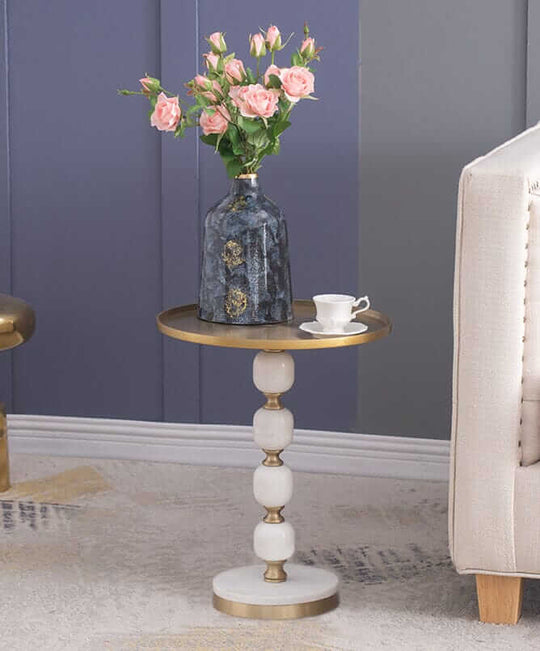 Hand-made JESICCA marble and aluminium side table with flowers and a cup, perfect for stylish home decor.