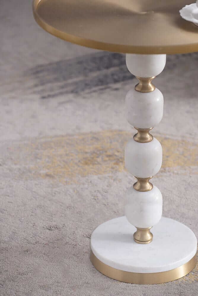 Elegant JESICCA marble and aluminum side table showcasing luxury design and handcrafted quality for stylish interiors.