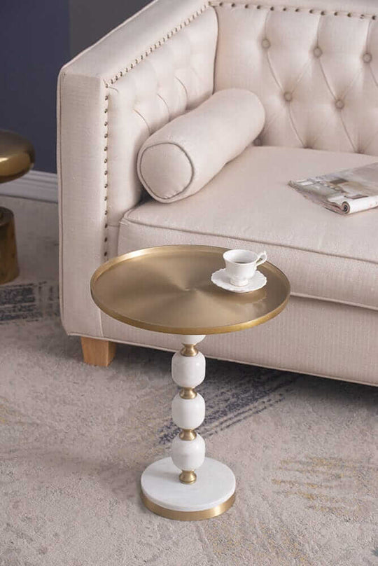 Handcrafted JESICCA marble and aluminium side table with gold accents, perfect for adding elegance to any living space.