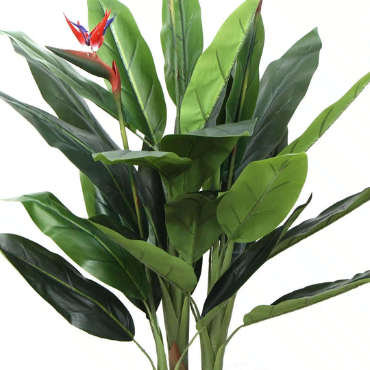 Artificial Bird of Paradise Plant with vibrant red flowers and lush green leaves, ideal for affordable tropical home decor.