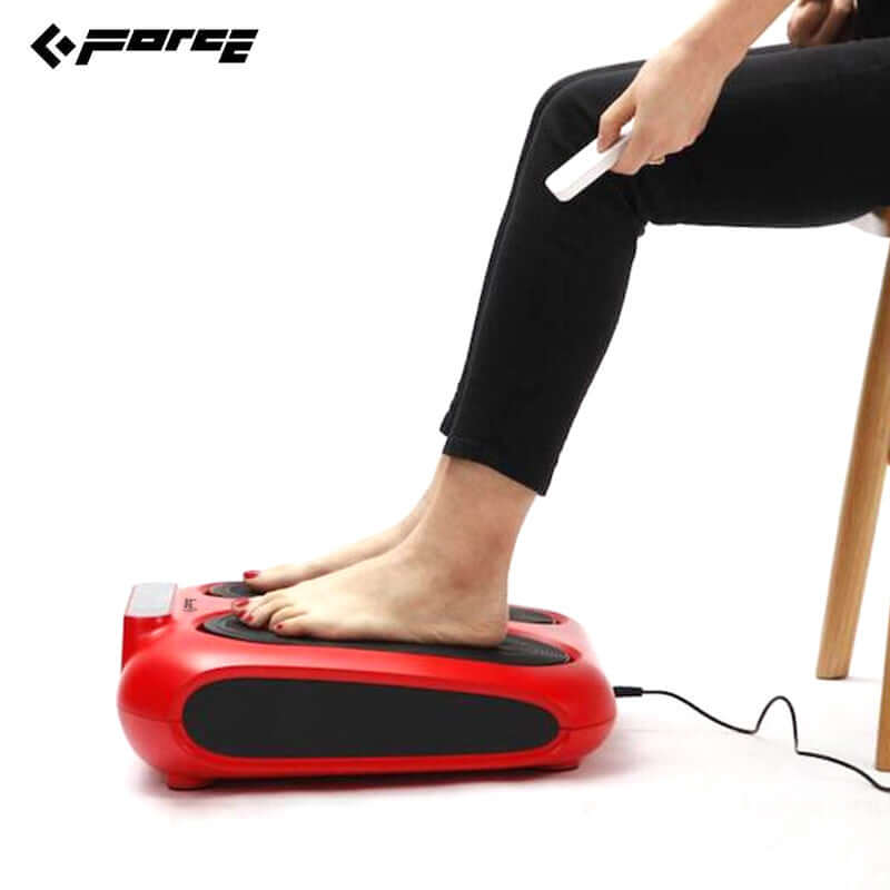 Red massage device relieving pain in feet with remote control, promoting circulation and comfort.