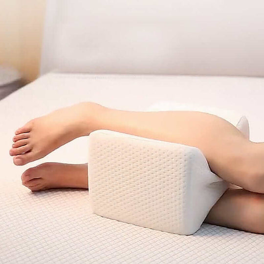 Memory foam sciatica relief leg pillow supporting legs for pain-free sleep, affordable and quality comfort.