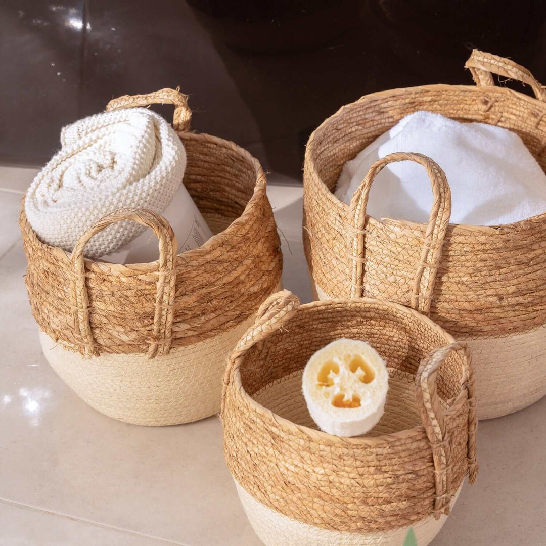 Affordable 3 piece cotton rope storage baskets set with carry handles, perfect for stylish organization and decoration.