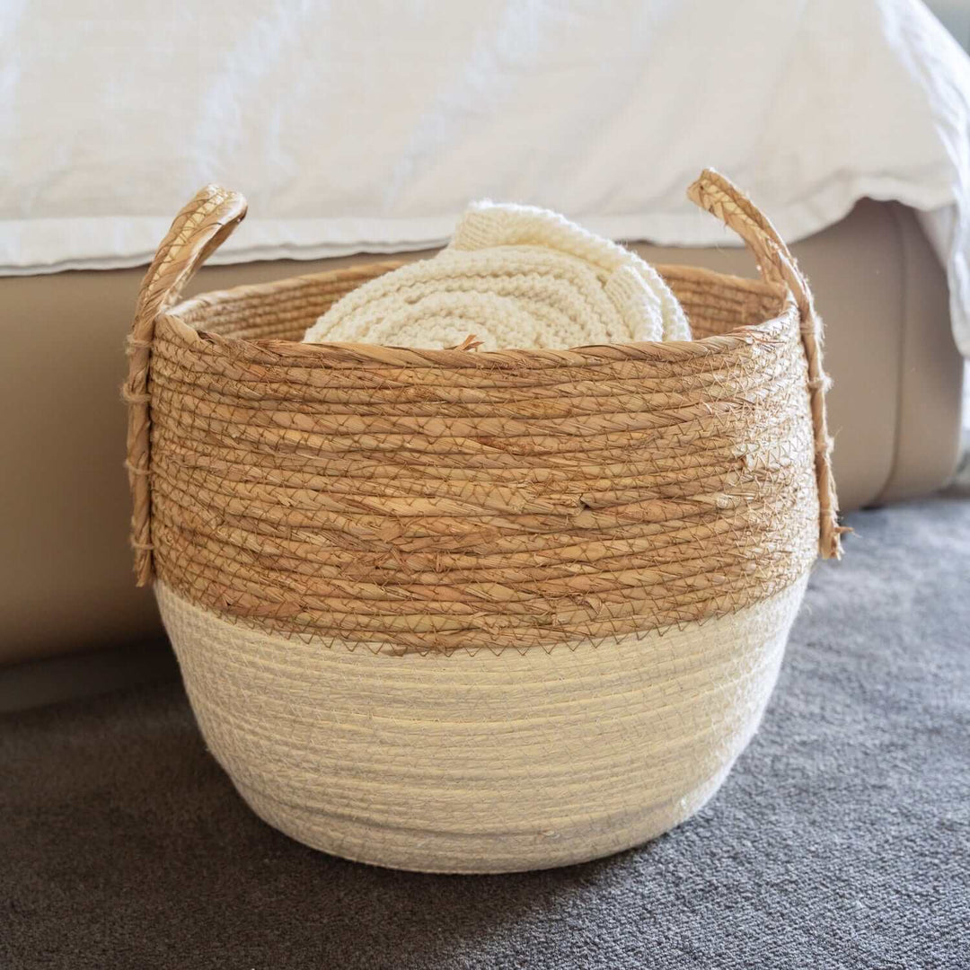 Affordable 3 piece cotton rope storage basket set with carry handles, perfect for stylish home organization.