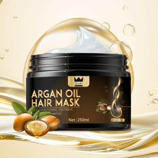 Xiodi Argan Oil Hair Mask in a black jar surrounded by argan nuts, ideal for dry and damaged hair, affordable DIY treatment.