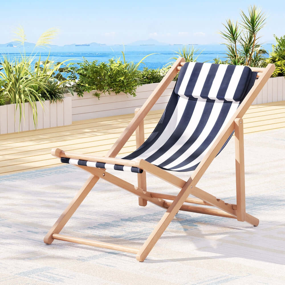 Gardeon folding beach chair in blue and white stripes, perfect for affordable backyard relaxation and DIY patio decor.