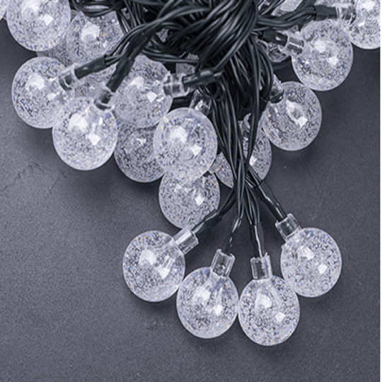 Noveden 200 warm light solar string lights with crystal-like bulbs for affordable and quality festive decor.