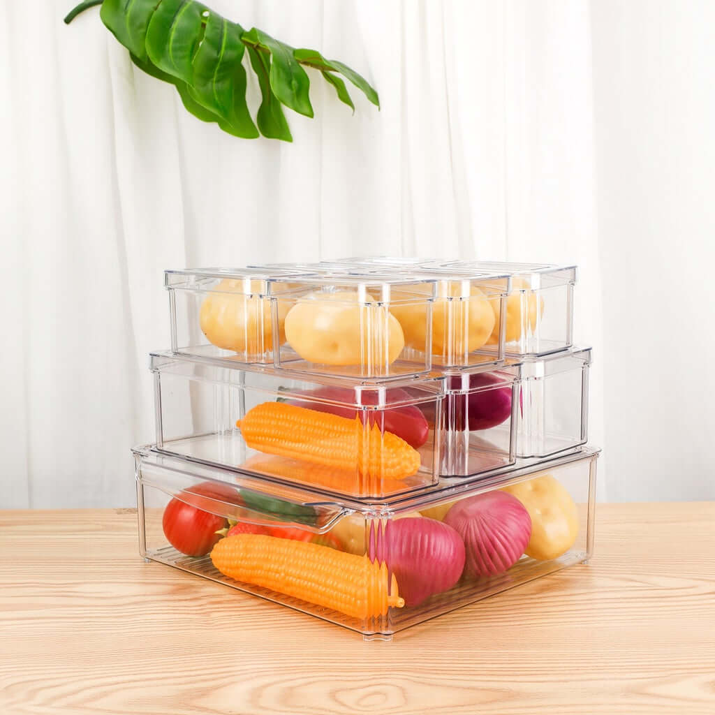 GOMINIMO clear stackable fridge organizer bins with lids showcasing assorted vegetables and fruits on a wooden surface.