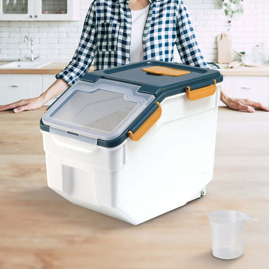 Gominimo airtight blue rice grain storage container with locking mechanism on kitchen counter.