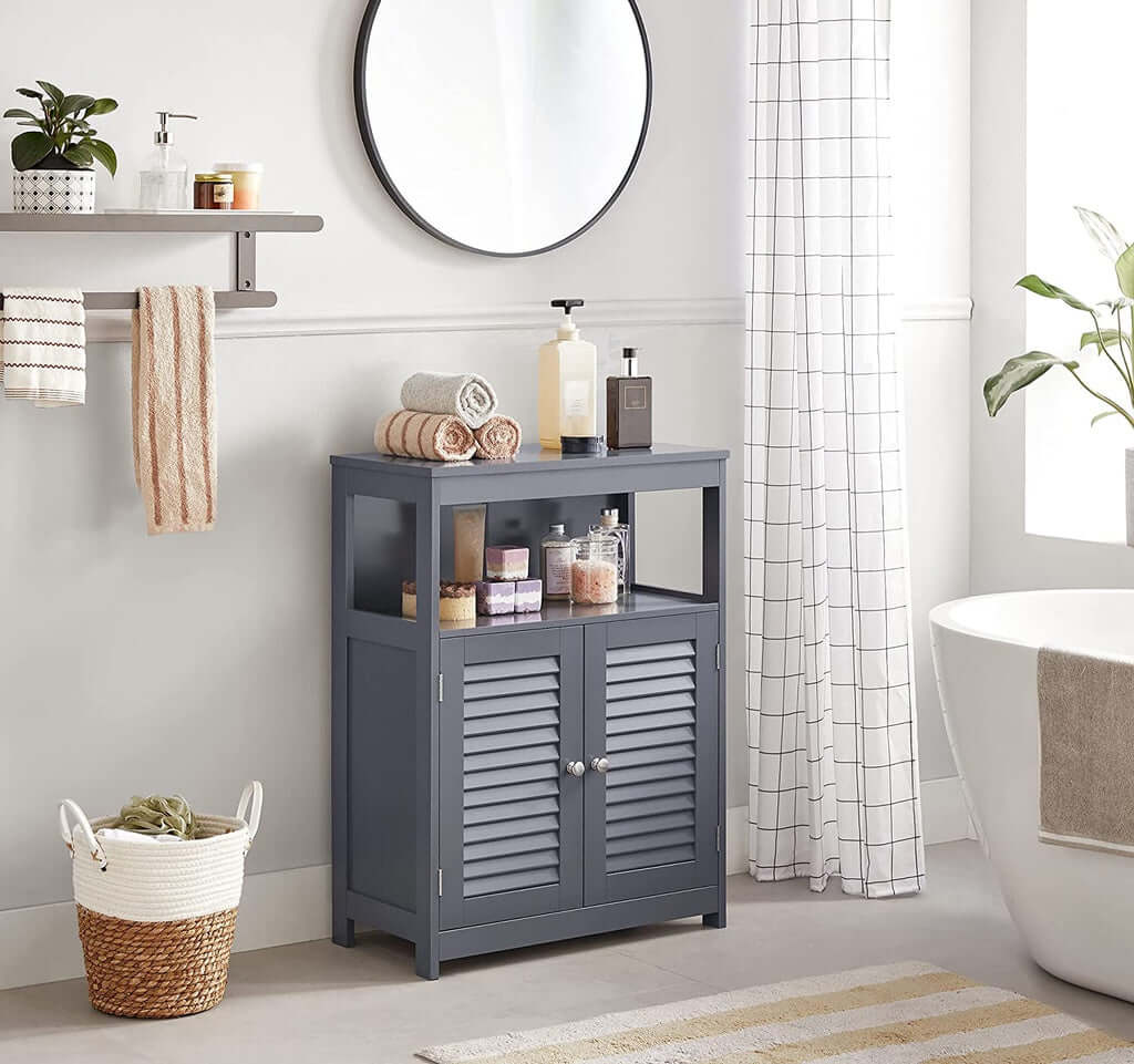 Gray VASAGLE floor cabinet with louvered doors in a modern bathroom setting, showcasing affordable DIY luxe storage solutions.