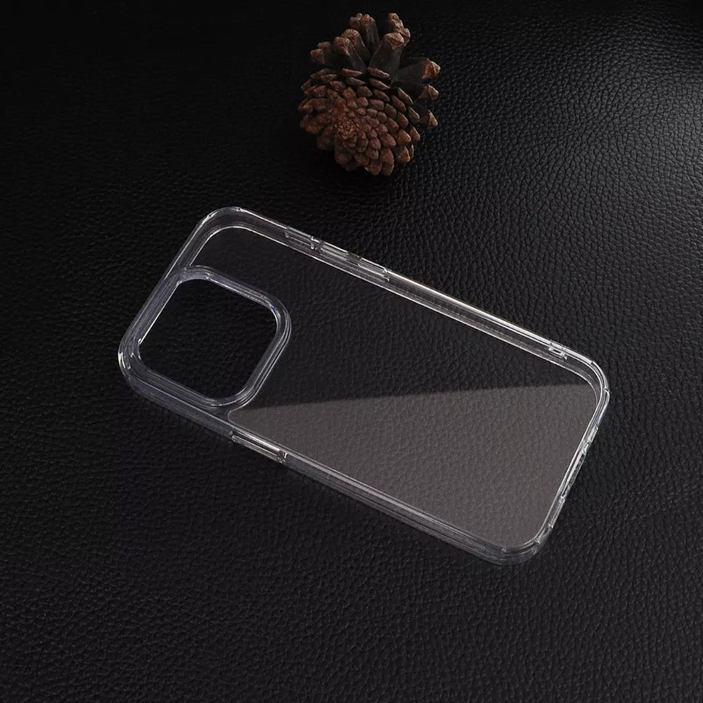 Clear phone case on black leather surface with a pine cone in the background.