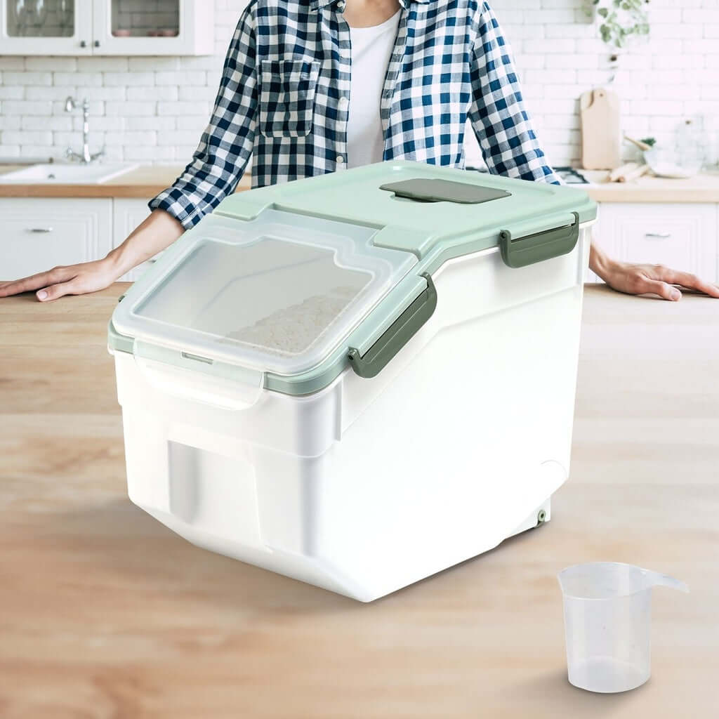 GOMINIMO multipurpose food storage container in green, featuring airtight seal and locking mechanism for pet food and grains.