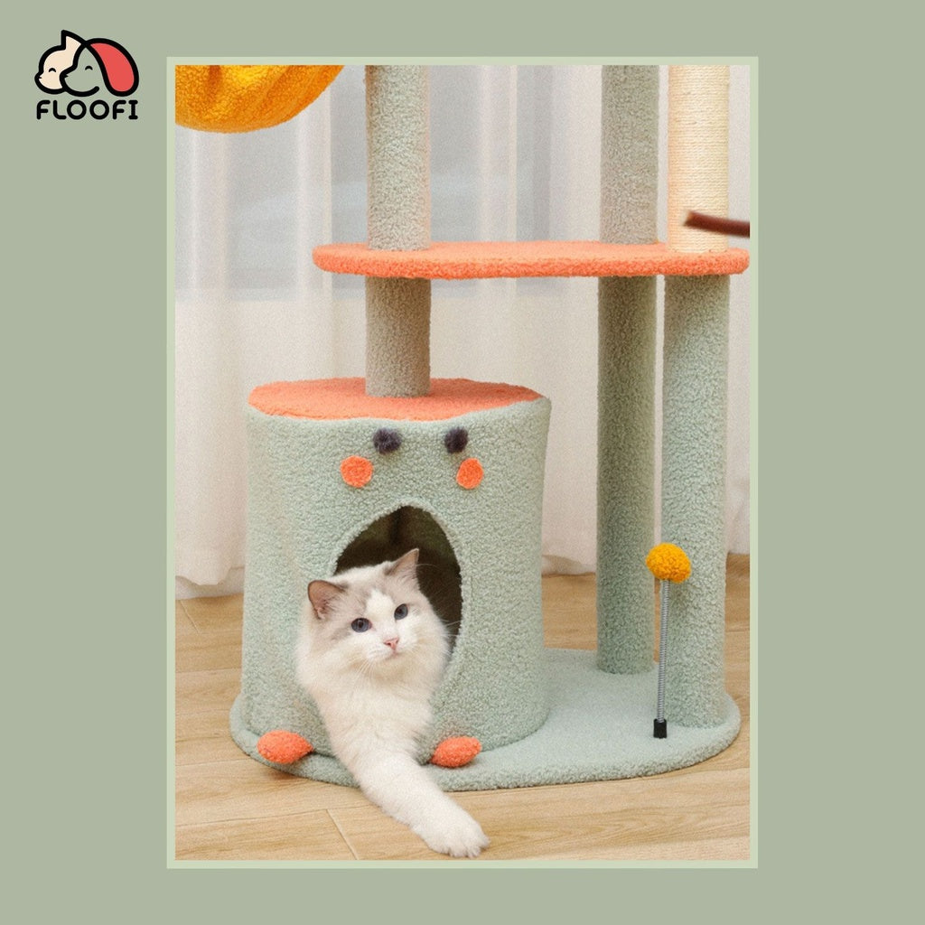 Cat lounging in a fluffy cat tree house from Floofi with playful designs and cozy resting spots.