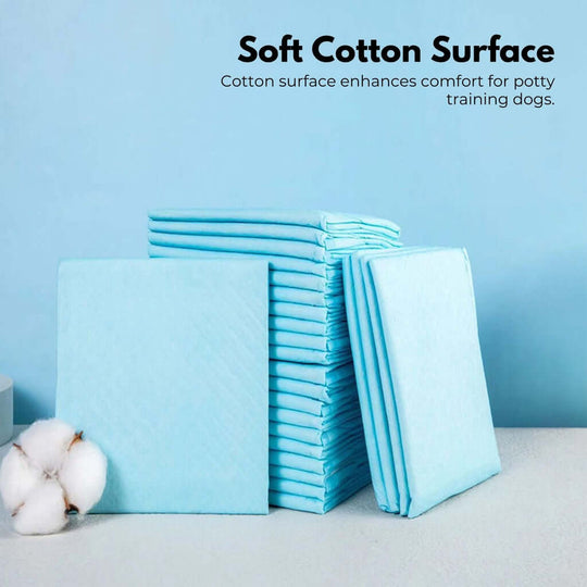 Soft cotton dog potty training pads stacked neatly, enhancing comfort and odor control for pets.