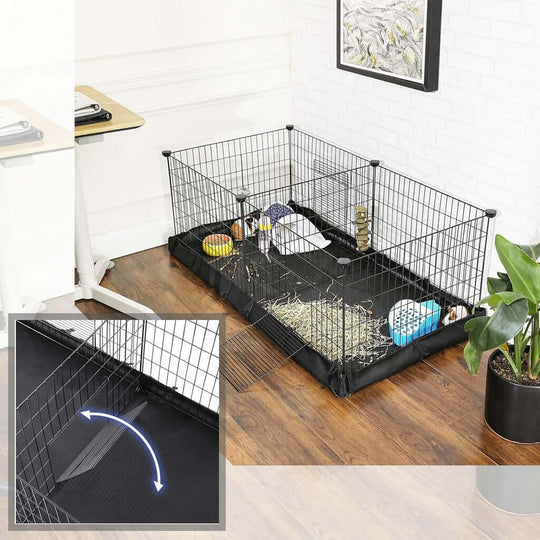 SONGMICS black pet playpen with waterproof floor mat and divider in a cozy indoor setting, perfect for affordable DIY pet care.