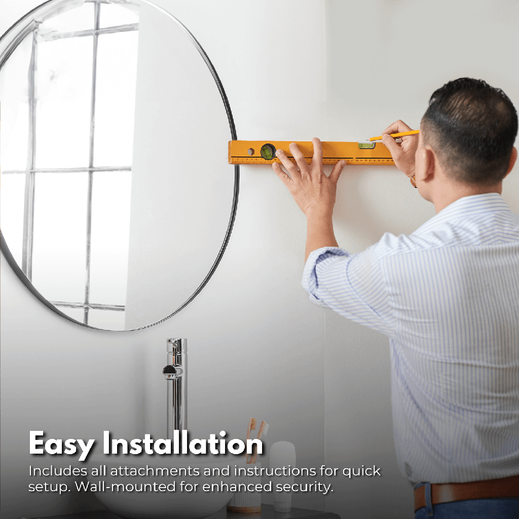 Man installing circular bathroom mirror using a leveling tool for easy DIY wall mount setup.