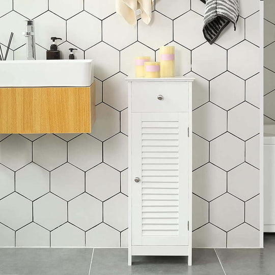 Affordable white VASAGLE floor cabinet with drawer and door, perfect for DIY storage solutions in modern bathroom.