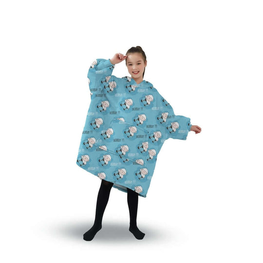 Happy child wearing a light blue GOMINIMO hoodie blanket featuring cute sheep designs, showcasing comfort and style.