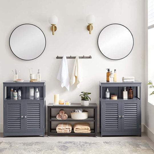 Modern bathroom with VASAGLE gray floor cabinets, louvered doors, mirrors, and decor items, offering affordable luxe style.