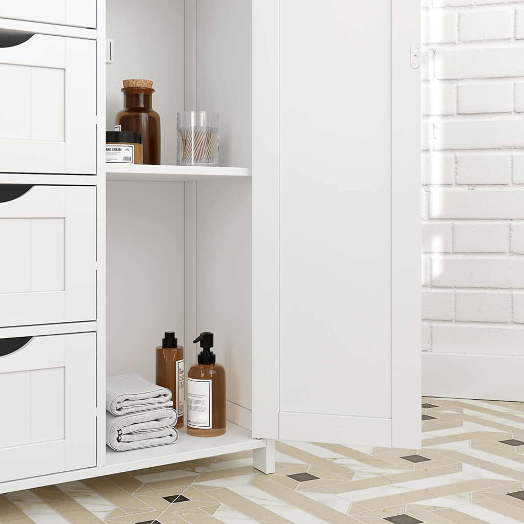 White VASAGLE floor cabinet with open shelf displaying towels and toiletry bottles, ideal for affordable and stylish DIY home decor.